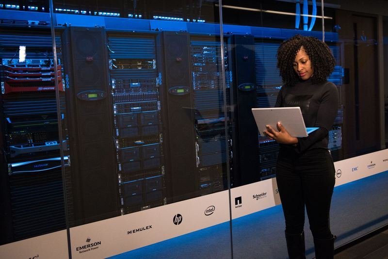 Engineer checking servers in a data centre
